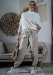 Světle béžové kalhoty se zavazováním na nohavici STEMPSY